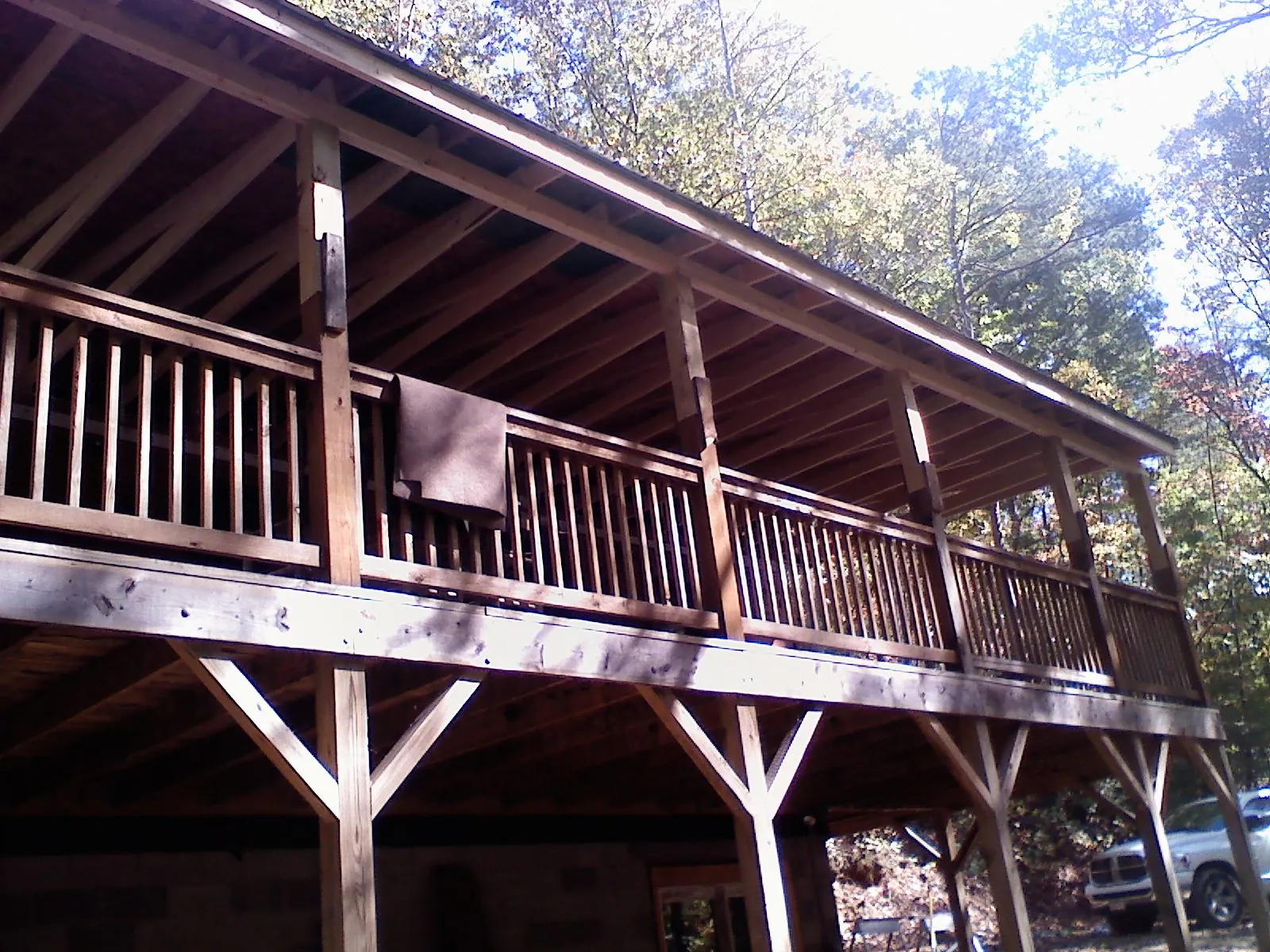 Timber framing under a new elevated porch and deck — Roof Leak Repair in Siler City by Roofing Brothers